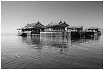 Restaurant built on stilts in middle of lake. Inle Lake, Myanmar ( black and white)