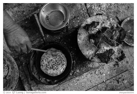 Pancackes cooked on coals. Inle Lake, Myanmar (black and white)