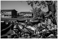Market, boats, and village houses on stilts. Inle Lake, Myanmar ( black and white)