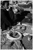 Market vendor with cheerot cigar. Inle Lake, Myanmar ( black and white)