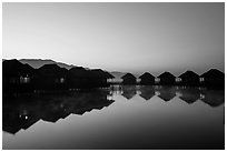 Resort cottages at dawn. Inle Lake, Myanmar ( black and white)