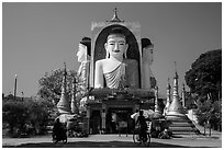 Four buddhas sitting back to back to four directions, Kyaik Pun Pagoda. Bago, Myanmar ( black and white)