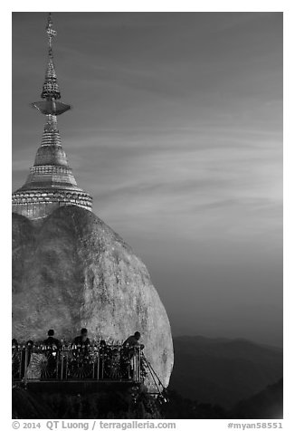 Sunset colors the sky above the Golden Rock. Kyaiktiyo, Myanmar (black and white)