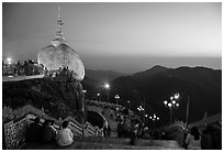 Platforms around the Golden Rock at sunset. Kyaiktiyo, Myanmar ( black and white)