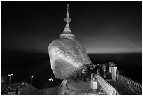 Bridge to the Golden rock with last light on horizon. Kyaiktiyo, Myanmar ( black and white)