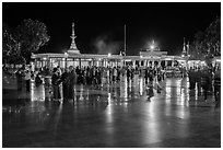 Crowds on main plaza at night. Kyaiktiyo, Myanmar ( black and white)
