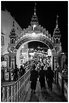 Entrance to Potemkin village of restaurants and souvenir shops. Kyaiktiyo, Myanmar ( black and white)