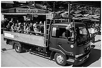 Truck carrying pilgrims to the top of Kelasa Hill. Kyaiktiyo, Myanmar ( black and white)
