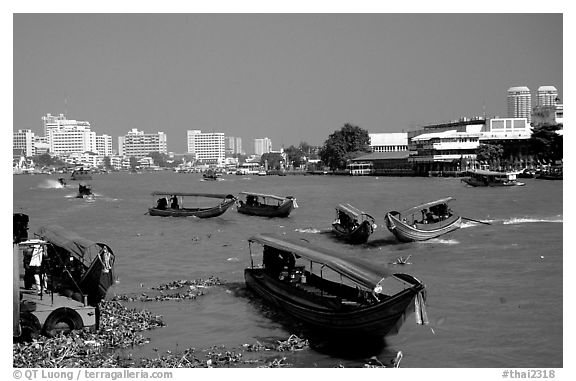 Chao Phraya river crowded with boats. Bangkok, Thailand