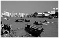 Chao Phraya river crowded with boats. Bangkok, Thailand ( black and white)