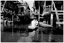 Houses along khlong on Thonbury canals. Bangkok, Thailand (black and white)