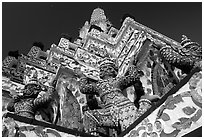 Statues at the base of the prang, Wat Arun. Bangkok, Thailand ( black and white)