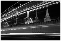 Wat Phra Kaew seen through the lights of traffic. Bangkok, Thailand (black and white)
