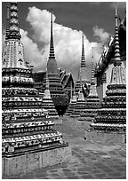 Layered and streamlined chedis in Ratanakosin style, Wat Pho. Bangkok, Thailand (black and white)