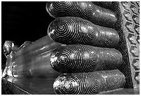 Largest reclining Budhha in Thailand, in Wat Pho. Bangkok, Thailand (black and white)