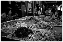 Variety of spicy foods in a market. Bangkok, Thailand (black and white)