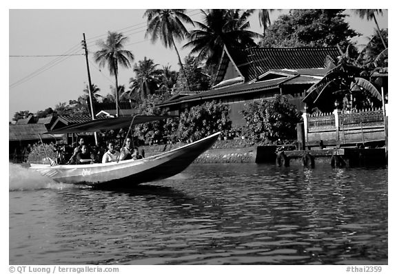 Fast boat along khlong on Thonbury canals. Bangkok, Thailand (black and white)