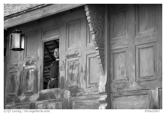Man at window. Muang Boran, Thailand (black and white)