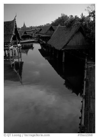 Village along canal. Muang Boran, Thailand (black and white)