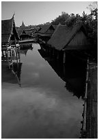 Village along canal. Muang Boran, Thailand (black and white)