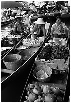 Small boats loaded with food, Floating market. Damonoen Saduak, Thailand (black and white)