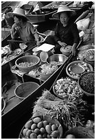 Women selling fruits and vegetables, Floating market. Damonoen Saduak, Thailand (black and white)