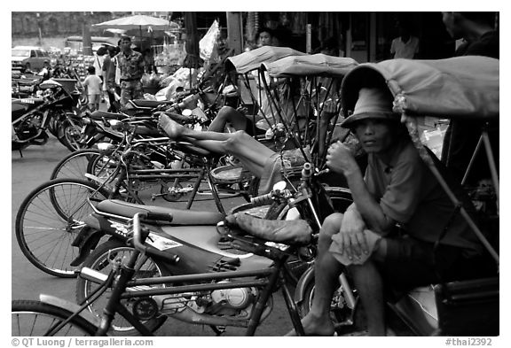 Tricycle drivers. Nakhon Pathom, Thailand (black and white)