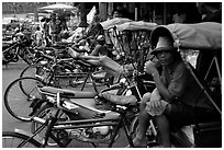 Tricycle drivers. Nakkhon Pathom, Thailand (black and white)