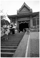 San Phra Kan (Kala shrine), invaded by monkeys. Lopburi, Thailand (black and white)