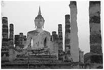 Wat Mahathat, the most important complex of Sukhothai, dusk. Sukothai, Thailand (black and white)