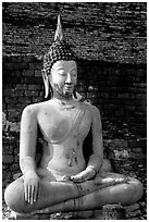 Classic sitting Buddha image, with boneless style typical of period. Sukothai, Thailand (black and white)