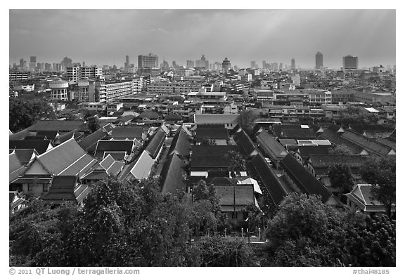 Temple complex and city skyline. Bangkok, Thailand