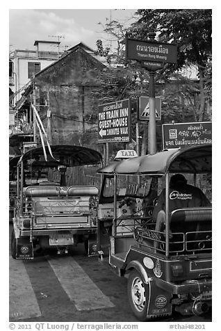 Tuk Tuks and signs. Bangkok, Thailand (black and white)