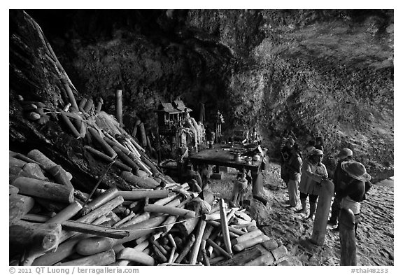 Locals worship at Pranang Cave, Railay. Krabi Province, Thailand