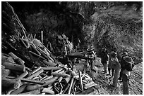 Locals worship at Pranang Cave, Railay. Krabi Province, Thailand (black and white)