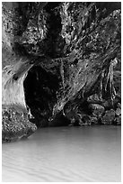 Limestone overhang and turquoise waters, Rai Leh. Krabi Province, Thailand (black and white)