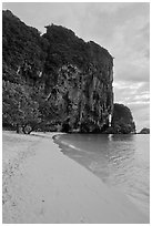 Pranang Cave Beach and limestone crag, Railay. Krabi Province, Thailand (black and white)