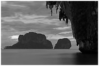 Limestone stalactite framing islets, Rai Leh. Krabi Province, Thailand (black and white)