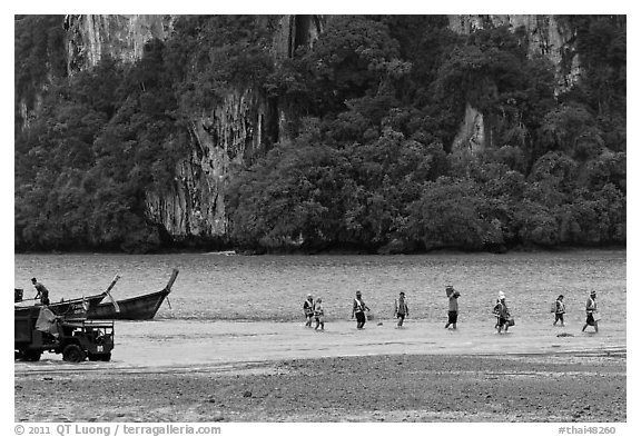 Disembarking at low tide, Rai Leh East. Krabi Province, Thailand