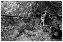 Hiker on steep trail, Laem Phra Nang, Rai Leh. Krabi Province, Thailand ( black and white)