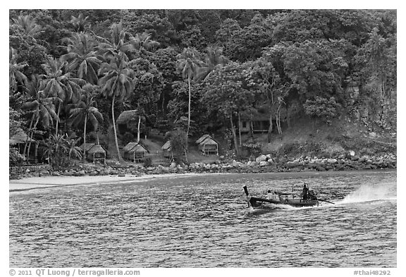 Long tail boat and beach cabins, Ko Phi Phi. Krabi Province, Thailand (black and white)