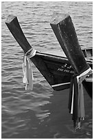 Ribons on prow of two longtail boats, Ko Phi-Phi Don. Krabi Province, Thailand (black and white)