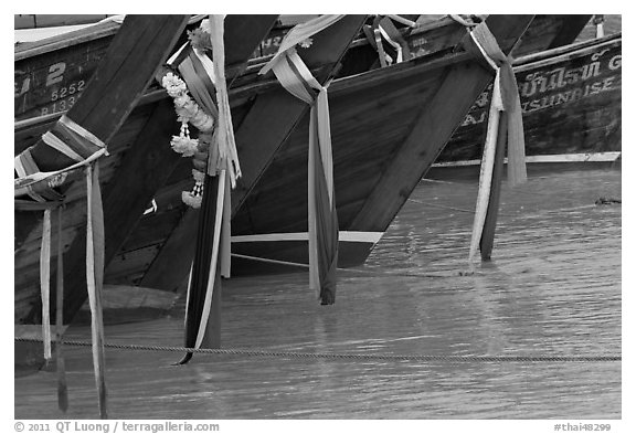 Prows of longtail boats with garlands, Ko Phi-Phi Don. Krabi Province, Thailand