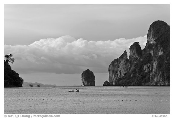 Distant boats and cliffs, Lo Dalam bay, Ko Phi-Phi Don. Krabi Province, Thailand (black and white)