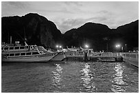 Harbor and cliffs at dusk, Ko Phi-Phi island. Krabi Province, Thailand ( black and white)