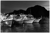 Fishing and tour boats at night, Ko Phi-Phi Don. Krabi Province, Thailand (black and white)
