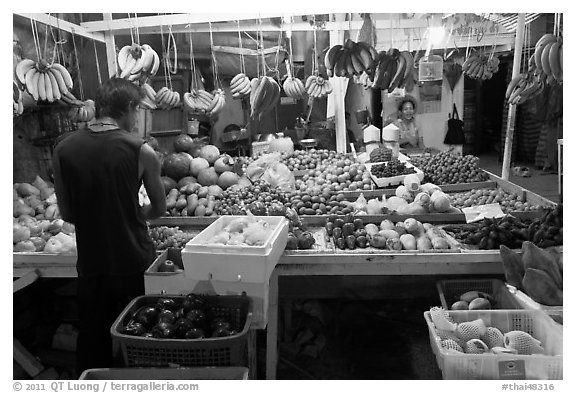 Fruit stall at night, Tonsai village, Ko Phi Phi. Krabi Province, Thailand (black and white)