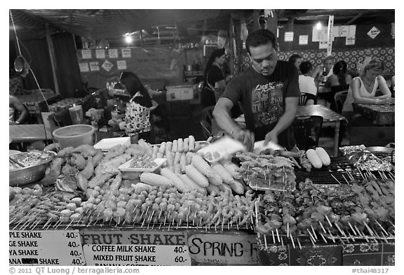 Restaurant with seefood on skewers, Phi-Phi island. Krabi Province, Thailand (black and white)