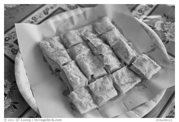 Thai pancake on plate, Tonsai village, Phi-Phi island. Krabi Province, Thailand (black and white)