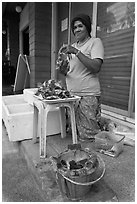 Woman selling grilled seafood, Tonsai village, Ko Phi-Phi island. Krabi Province, Thailand (black and white)